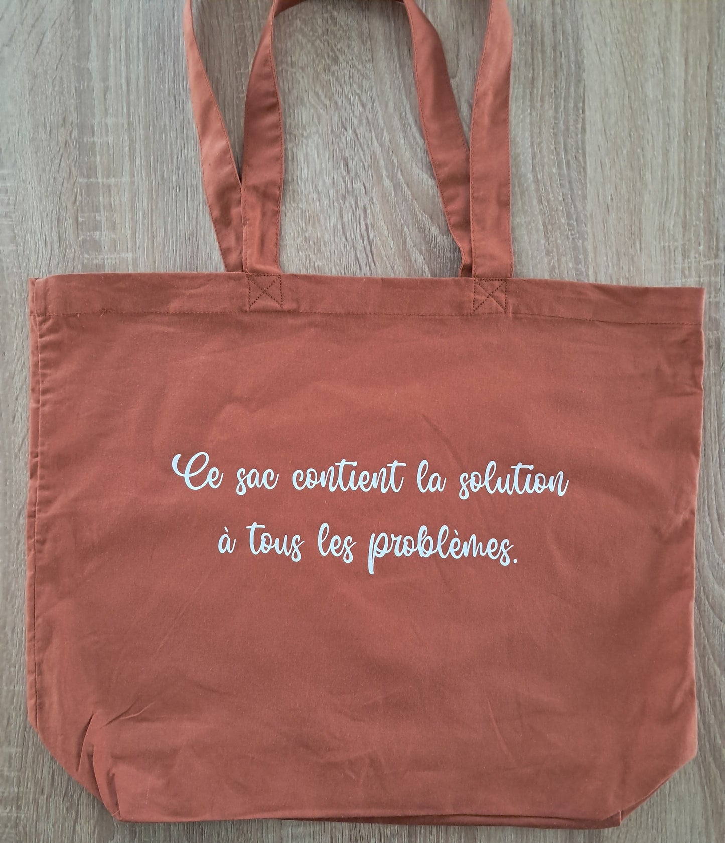 Grand sac de shopping "Ce sac contient la solution à tous les problèmes"